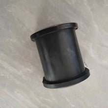Charger l'image dans la galerie, Black rubber bearing bushing viewed from side with base ring