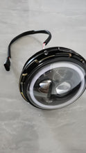 Cargar imagen en el visor de la Galería, LED headlamp with clear lens and black wiring harness, top-side view