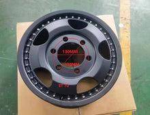 Load image into Gallery viewer, 17-inch rim with 6 lug bolt holes, dark gray face and silver spoke pockets