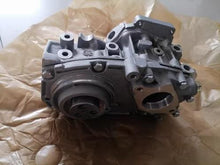 Załaduj obraz do przeglądarki galerii, Engine oil pump unit with front circular pump outlet and machined ports, gray metal by SUONAMA