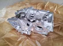 Załaduj obraz do przeglądarki galerii, Engine oil pump assembly with metal housing and mounting brackets, gray finish by SUONAMA .