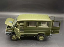 Charger l'image dans la galerie, 1:24 scale green camouflage off-road van model, rear-side view with open cargo door