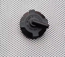 Afbeelding in Gallery-weergave laden, Black expansion tank cap with vented center and raised markings on top