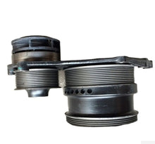 Carica l'immagine nel visualizzatore di Gallery, Water pump with black metal housing and threaded ports, close-up