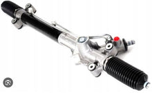 Carregar imagem no visualizador da galeria, Steering gear rack with black rubber boots and metal housing, angled view