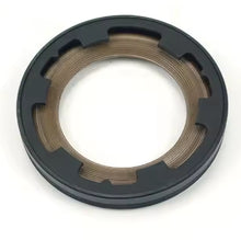 Carregar imagem no visualizador da galeria, Front shaft seal with dark outer housing and visible inner metal spring