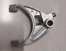 Carregar imagem no visualizador da galeria, Transfer case fork lever with large circular bushing and mounting tabs, metallic gray