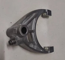 Carregar imagem no visualizador da galeria, Transfer case fork with circular pivot hole and two bracket tabs, gray metal
