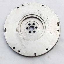 Carica l'immagine nel visualizzatore di Gallery, Steel flywheel with outer ring teeth, bolt holes, and center mounting plate