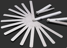 Carica l'immagine nel visualizzatore di Gallery, Valve clearance gauge tool with fanned metal blades and central measuring wheel.