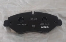 Carica l'immagine nel visualizzatore di Gallery, Front brake pad set, dark gray friction pads with mounting holes and wear markings