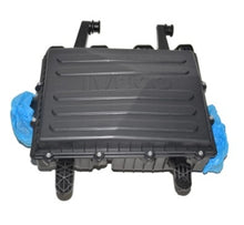 Charger l'image dans la galerie, Black air filter housing with ribbed cover, mounting feet, and latch details