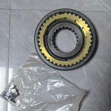 Charger l'image dans la galerie, Steel synchronizer ring with gear teeth and brass-colored outer ring; includes small hardware