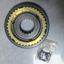 Carica l'immagine nel visualizzatore di Gallery, Circular synchronizer assembly with yellow brass ring and black outer housing