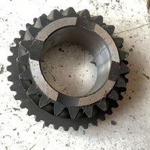 Carregar imagem no visualizador da galeria, Dark steel spur gear with central bore and surrounding gear teeth