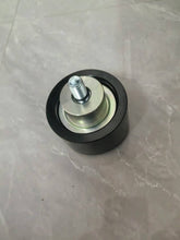 Carregar imagem no visualizador da galeria, Belt tensioner pulley with exposed threaded stud and metal insert, silver and black