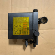 Carica l'immagine nel visualizzatore di Gallery, Black cab lift pump control unit with yellow caution label and inlet ports