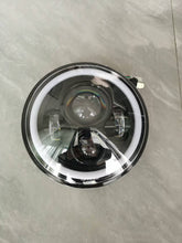 Cargar imagen en el visor de la Galería, LED headlamp with circular bezel and clear lens, top-down view