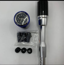 Cargar imagen en el visor de la Galería, Silver shift knob lengthener with clock gauge, carbon-fiber top, and mounting rubber caps