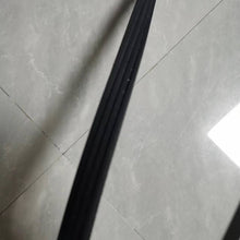 Charger l'image dans la galerie, Narrow view of a long black rubber belt strap