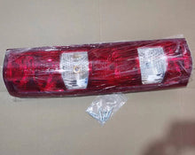 Carica l'immagine nel visualizzatore di Gallery, Red tail lamp assembly with two clear rectangular lenses and amber bulb, plastic wrapped by SUONAMA