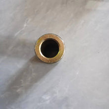 Carregar imagem no visualizador da galeria, Iron inner bushing with flanged outer ring and central hole, shows green ring on edge
