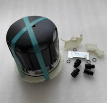 Charger l'image dans la galerie, Automotive dryer cartridge with black body and green strap, plus white plastic and rubber parts
