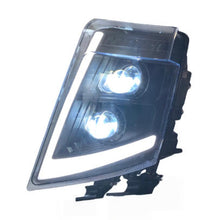 Załaduj obraz do przeglądarki galerii, LED headlight with two circular blue-white LED bulbs, angled lens housing