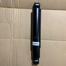 Carregar imagem no visualizador da galeria, Front shock absorber, black cylinder with mounting ends and label barcode
