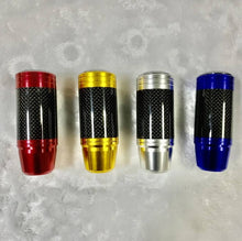 Charger l'image dans la galerie, Four clock-dial shift knobs with carbon-look grip in red, gold, silver, and blue
