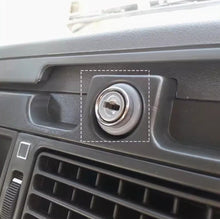 Laden Sie das Bild in den Galerie-Viewer. Dashboard lock cylinder with key inserted, shown in front grille opening
