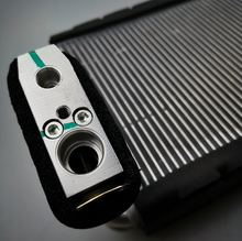 Load image into Gallery viewer, Car HVAC evaporator core detail with metal ports and black foam mounting
