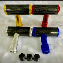 تحميل الصورة في عارض المعرض، Carbon fiber shift knob set with red and blue accents and three black collars.