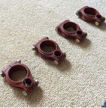Load image into Gallery viewer, Set of four front stabilizer bar retaining clips, burgundy plastic with metal bolts