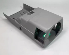 Load image into Gallery viewer, Integrated switch cover, light gray plastic housing with front opening and louvered slots.