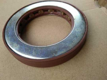 Load image into Gallery viewer, Differential oil seal with brown rubber seal and silver metal outer ring