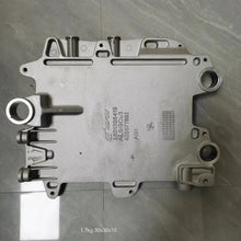 Carica l'immagine nel visualizzatore di Gallery, Metal ECU mounting bracket with mounting holes, springs, and circular openings