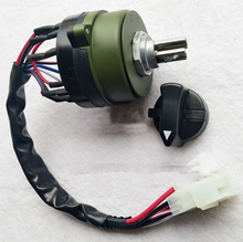Carregar imagem no visualizador da galeria, Headlight switch with olive housing, metal shaft, black knob, and wire connector plug