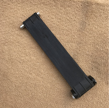 Cargar imagen en el visor de la Galería, Black front door stopper assembly, ribbed strip with end caps and metal feet