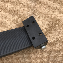 Cargar imagen en el visor de la Galería, Black ribbed door stopper bar with metal bracket plate and mounting holes