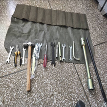 Charger l'image dans la galerie, Vehicle tool kit pouch open with wrenches, pliers, and a hammer plus two metal rods