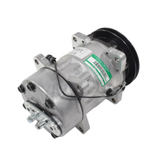 Charger l'image dans la galerie, Air conditioning compressor with side ports, black clutch pulley, and mounted label.
