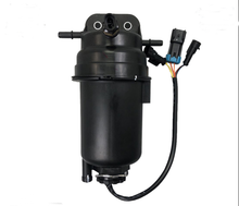 Cargar imagen en el visor de la Galería, Fuel filter assembly with black housing and electrical connectors on a wire harness