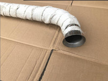 Charger l'image dans la galerie, Exhaust pipe front section close-up: round outlet with white heat wrap