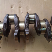 Carica l'immagine nel visualizzatore di Gallery, Crankshaft assembly side view of two crank throws with metal main journals