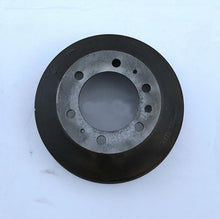 Załaduj obraz do przeglądarki galerii, Rear brake drum with center hub and multiple bolt holes, dark outer rim