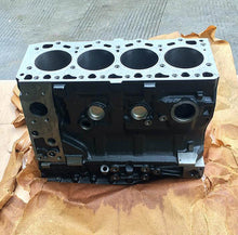 تحميل الصورة في عارض المعرض، Engine cylinder block front view with four cylinder bores and black underside