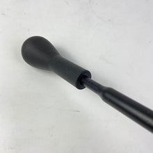 Charger l'image dans la galerie, Gear lever sleeve assembly rubber boot sleeve and dark metal rod, close-up detail.