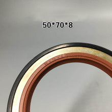 Carica l'immagine nel visualizzatore di Gallery, Round oil seal with embossed size 50*70*8, black outer and copper-brown inner ring