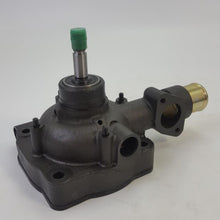 Załaduj obraz do przeglądarki galerii, Water pump assembly with green-capped shaft, black base and side ports